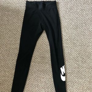 Black Nike leggings w/ nike symbol and writing